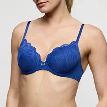 Load image into Gallery viewer, Blue bra worn by a model on a plain background