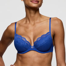 Load image into Gallery viewer, Blue bra worn by a model on a plain background