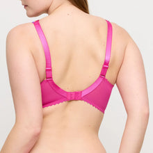 Load image into Gallery viewer, Pink bra worn by a person on a plain background