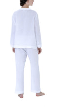 Load image into Gallery viewer, Classic 100% Pre-washed Linen Pyjamas. Revere collar on loose jacket. The pocket on the hip has a feminine lace trim. Full length trousers with a gentle elasticated waist. Celestine garments are also addictive, so watch out. Once tried, there is no turning back! Celestine nightwear, dressing gowns, short robes and pyjamas drop from the shoulder, therefore one size fits all. Composition: 100% Linen 100% Guipure Lace Machine Washable