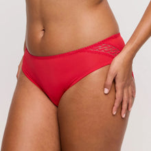 Load image into Gallery viewer, Red bikini bottom worn by a person on a light gray background