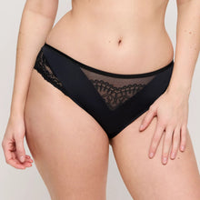 Load image into Gallery viewer, Black lace underwear worn by a person on a plain background