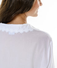 Load image into Gallery viewer, Pure white pure cotton Pyjamas. Buttoned at the front with a revere collar. Gorgeous pure cotton guipure lace detail on the collar, sleeve cuff and trouser hem. Full length trouser with a soft elasticated waist. Perfect for sleeping or lounging. Celestine garments are also addictive, so watch out. Once tried, there is no turning back! Celestine nightwear, dressing gowns, short robes and pyjamas drop from the shoulder, therefore one size fits all.
Fabric composition: 100% Cotton.
Made in Germany.