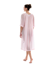 Load image into Gallery viewer, Rose Full length (123cm) 3/4 length sleeve nightgown. Gorgeous 100% Guipure Cotton Lace at the gently rounded neckline and a frilled detail at the sleeve hem. Flared skirt for ease of movement when sleeping. Made in Germany from the finest pure cotton mousseline, Celestine nightdresses are diaphanous, offering perfect sleep without heaviness.
Celestine nightwear, dressing gowns and short robes drop from the shoulder, therefore one size fits all.
Composition: 100% Pure Swiss Cotton, 100% Guipure Cotton Lace