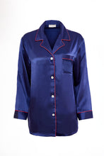 Load image into Gallery viewer, Our own classic pure silk 'men's style' pyjamas. They are made from 19 mm 100% pure heavyweight Silk Satin. One seam on the leg for extra comfort. Mother-of-pearl buttons, elastic waist the trousers. Perfect for sleeping and loungewear. Available in two colourways: Navy/Crimson Piping.