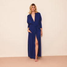 Load image into Gallery viewer, Night Blue full length Cashmere/Wool Kimono style dressing gown. There are two patch pockets at the front, and a slim belt at the waist. The comfort and absolute softness of this robe makes it ideal for staying stylish, warm and comfortable at home.
Fabric Content: 50% Cashmere, 50% Wool
125cm in length
Machine washable