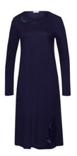 Load image into Gallery viewer, Evening Blue Attractive 100% soft mercerised knitted cotton. This is a Long Sleeve 3/4 length nightgown with a gentle round neckline. It has a lace inset on the neckline mirrored by a deep lace inset on the opposite hem. Light and airy to wear in bed. Deliciously comfortable for sleeping and lounging.
Length: 110cm
Composition: 100% Pure Cotton, 100% Polyester Lace.
Made in Europe
Machine washable
