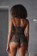 Load image into Gallery viewer, A sheer Lace body made of a fine lace with subtle transparency, it is decorated with contrasting lace at the neckline and hem to emphasise the curves. The waist is slightly elasticised for a loose, fluid and comfortable wear. The straps are adjustable to fit perfectly to your figure.
Image of the back.