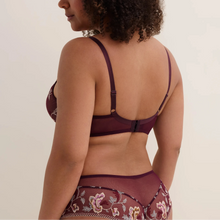 Load image into Gallery viewer, A woman shown from the back wearing a matching burgundy sheer lingerie set with floral embroidery, photographed against a plain light beige studio background.