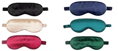 Our own 100% Pure Mulberry Silk Eye Mask.  Our sleep mask has a delicate piped detail around its edge for extra elegance and is plumply padded for comfort. The back strap is also covered in silk for smoothness and style. Sleeping with an eye mask cuts out artificial and natural light, allowing for a deeper sleep without bulk. Using a silk sleep mask smooths the skin around the eyes, like a mini spa treatment!