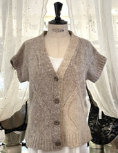 Load image into Gallery viewer, Biscuit Melange Soft Alpaca &amp; Merino wool bedjacket.  Short sleeve and button through. This is a light and cosy bedjacket. But also perfect for lounge or outerwear.   Made in Italy Fabric Composition: 45% Alpaca, 30% Merion Wool, 25% Polyamide.  Machine Washable.
