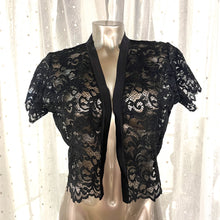 Load image into Gallery viewer, SALE Made in Florence, this is a beautiful all lace cropped over bolero jacket. Soft satin trim on the on the neckline continuing down the front edges. Perfect as a bedjacket, as outerwear particularly good for bridal wear. Composition: All Lace: 67% cotton, 33% polyamide. Machine washable.
