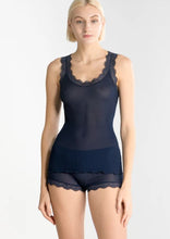 Load image into Gallery viewer, Black. Singlet style delicate fine ribbed knit fabric in pure silk organza with the most elegant and feminine French leavers lace and the neckline and shoulder. The lace is certified and numbered as true “Dentelle de Calais®”. Super-soft touch with no side seams, the construction is for the ultimate in comfort. Featuring a gently scooped neckline this singlet allows for a multiple of uses, as underwear or outerwear. 100% Silk All Oscalito Sik is certified GOTs. Machine washable