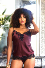Load image into Gallery viewer, Burgundy/Black. Pure Silk Camisole & Brief Set. Generously embellished with appliqué Calais lace. The Camisole has rouleau adjustable straps. The appliqué lace forms a sumptuous detail on the front, continuing down the sides of the garment. The briefs have a sumptuous detail of appliqué lace on both hips.
Composition: 100% Silk Satin
Calais Lace 75% Cotton, 25% Nylon
Machine washable