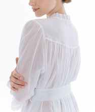 Load image into Gallery viewer, Pure White. Full length (130cm), frilled collar robe. Made in Germany from the finest mousseline, this full length, diaphanous dressing gown is a 100% pure cotton. It offers the wearer perfect cover without heaviness. Celestine garments are addictive, so watch out. Once tried, there is no turning back! Celestine nightwear, dressing gowns and short robes drop from the shoulder, therefore one size fits all. Composition: 100% Pure Swiss Cotton Machine