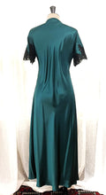 Load image into Gallery viewer, Made in Florence, this is a beautiful pure silk satin full length nightgown. There is stunning deep appliqué lace on the V neckline. The short sleeves also have a deep appliqué trim. There are French seams throughout for softness. This nightdress is cut on the bias with a deep pleat in the front, giving perfect movement. May be worn as underwear, nightwear or even outerwear. Generously cut. Composition: 100% Silk Satin. Lace: 67% cotton, 33% polyamide. Length: 130cm. Machine washable.