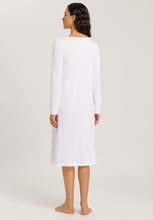 Load image into Gallery viewer, Made from 100% soft mercerised knitted cotton. This is a lovely 3/4 length long sleeve nightgown. Rounded neckline with an appliqué lace inset at the neck & front hem. Perfect item for lounging or sound sleep. Deliciously comfortable for sleeping and lounging. Length: 110cm Composition: 100% Pure Cotton 100% Polyester Lace Made in Europe Machine washable. Soft White.