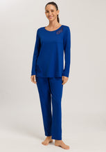 Load image into Gallery viewer, Made from 100% soft mercerised knitted cotton, Rounded neckline with an appliqué lace inset at the neck & front hem. Perfect item for lounging or sound sleep. Gentle rounded collar, long sleeves and with loose fitting trousers, elasticated at the waist. Composition: 100% Pure Cotton 100% Polyester Lace Made in Europe Machine washable. Indigo Blue.