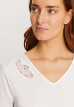 Load image into Gallery viewer, Soft White 100% soft mercerised knitted cotton. This is a lovely Short Sleeve V Neck nightgown. It has a lace inset on the neckline mirrored by a deep lace inset on the opposite hem. Light and airy to wear in bed. Deliciously comfortable for sleeping and lounging.
Length: 100cm
Composition: 100% Pure Cotton, 100% Polyester Lace.
Made in Europe
Machine washable
