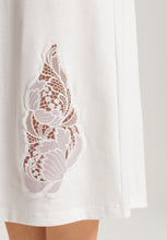 Load image into Gallery viewer, Soft White Attractive 100% soft mercerised knitted cotton. This is a Long Sleeve 3/4 length nightgown with a gentle round neckline. It has a lace inset on the neckline mirrored by a deep lace inset on the opposite hem. Light and airy to wear in bed. Deliciously comfortable for sleeping and lounging.
Length: 110cm
Composition: 100% Pure Cotton, 100% Polyester Lace.
Made in Europe
Machine washable