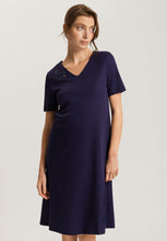Load image into Gallery viewer, Evening Blue 100% soft mercerised knitted cotton. This is a lovely Short Sleeve V Neck nightgown. It has a lace inset on the neckline mirrored by a deep lace inset on the opposite hem. Light and airy to wear in bed. Deliciously comfortable for sleeping and lounging.
Length: 100cm
Composition: 100% Pure Cotton, 100% Polyester Lace.
Made in Europe
Machine washable