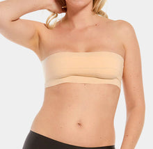 Load image into Gallery viewer, The MAGIC Bodyfashion Boob Tape allows you to lift your breasts without wearing a bra! It is the perfect bra solution for invisible styling under any backless, strapless or daring outfits while supporting your breasts. The strength of the tape makes it easy to adhere to the skin and features an adhesive silicone layer which can cover the nipples without irritating your skin. The roll of tape is 6,5cm wide and has a total length of 5 m. You can cut the tape to your desired length and use it in many different