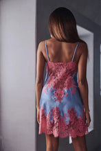 Load image into Gallery viewer, Made in France, a luminous pure silk satin night/slip.
Stunning handmade Calais lace appliqué detail at the bust and on the back, extending downwards to a deep hem.
The fine spaghetti straps are adjustable for the perfect fit.
This garment is cut on the bias with a flare, giving it a flowing movement.