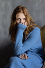 Load image into Gallery viewer, Sky Blue 100% Cashmere Dressing Gown is the perfect piece of nightwear or loungewear. Made in Ireland in a 2x2 rib knit 2 ply 100% cashmere. The ribbed texture gives this beautiful garment a modern contemporary look with all the comfort and of pure cashmere.
Kimono style robe, it has two patch pockets to the from, and double loops at the sides for the perfect placement of the belt.