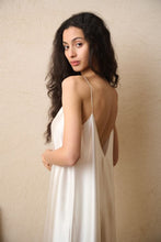Load image into Gallery viewer, Heavy weight Plain Ivory Silk Nightgown made by Luuna Mine; an artisan design studio based in Shanghai. This is a simple nightgown with a deep V back. It has adjustable spaghetti straps. Made 100% pure heavyweight Silk Satin and with French seams throughout. Perfect for sleeping, loungewear & perhaps even outerwear! Composition: Pure Silk Satin. Machine washable.