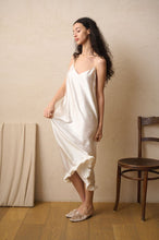 Load image into Gallery viewer, Heavy weight Plain Ivory Silk Nightgown made by Luuna Mine; an artisan design studio based in Shanghai. This is a simple nightgown with a deep V back. It has adjustable spaghetti straps. Made 100% pure heavyweight Silk Satin and with French seams throughout. Perfect for sleeping, loungewear & perhaps even outerwear! Composition: Pure Silk Satin. Machine washable.