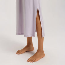 Load image into Gallery viewer, A close up of the hem of a Pink Lavender full length nightdress. Highlighting the featured slip on the side of the hem.