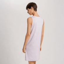 Load image into Gallery viewer, Image of the back of a woman wearing a Pink Lavender sleeveless short (knee length) nightdress. The garment has a lovely feminine flow to it.