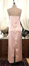 Load image into Gallery viewer, Champagne simple, plain & classic, full length silk satin nightgown. Made from 92% silk satin and with a little Elastane for stretch and movement. Adjustable spaghetti straps with a rounded neckline and all French seams for softness when wearing. The skirt is full length with a back slit. This garment is perfect for sleepwear or as a long slip under clothing. Generous sizing, if in doubt select the smaller size. Oscalito Silk is Certified GOTs Fabric Content: 92% Silk 8% Elastane