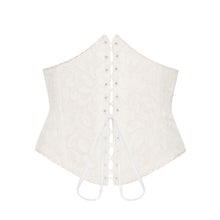 Load image into Gallery viewer, A beautiful ivory lace waspie, made of delicate lace and cotton lining. The waspie gently enhances your natural curves while a high-rise design accentuates your breasts.
Lacing at the front ensures ease of use and eye let closure on the side further assists with this.
Wear it discreetly under your clothes or style your outfit using it as a belt.
Your imagination, your style.
Made in France.