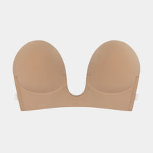 Load image into Gallery viewer, A beige strapless / backless underwire bra shown from the front on a light gray background.
