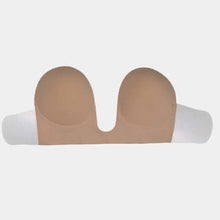 Load image into Gallery viewer, Beige strapless and backless bra on a white background. with wings attachment.