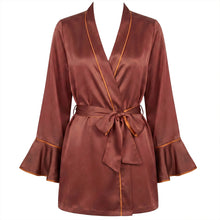 Load image into Gallery viewer, A burgundy silk satin robe with orange trim, featuring a shawl collar, matching waist tie belt, and flared sleeves, displayed on a white background.