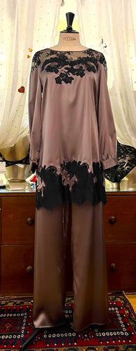 SALE Marjolaine pure silk pyjamas. Made from 100% pure heavy-weight silk. The top has a gentle rounded neckline with rich appliqué lace detail on both the top and hem. The trousers have an elasticated waist with a flat front panel for extra smoothness when sleeping. They are stylishly wide for extra comfort and movement. 