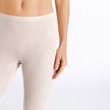 Load image into Gallery viewer, A close up of the vanilla silk cashmere leggings. Showcasing the soft edging around the waist.
