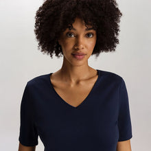 Load image into Gallery viewer, A close up of the neckline of the Cotton silk short sleeve nightdress displaying the silk trim on the V-Neck.