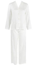 Load image into Gallery viewer, Ivory. Classic pure silk 'men's style' pyjamas. They are made from19mm 100% pure heavy weight Silk Satin. One seam on the leg for extra comfort. Mother-of-pearl buttons, elastic waist on the back of the trouser with a drawstring waist to the front. French seams throughout for that added comfort. Made in Florence,
Composition: Pure Silk Satin
Made in Italy
Machine washable.