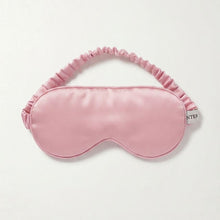 Load image into Gallery viewer, A light pink Pure silk satin sleep mask with a matching ruffled elastic strap, displayed flat against a clean off-white background.