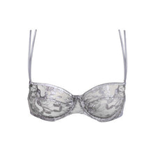 Load image into Gallery viewer, This is a perfect balconnet bra. The horizontal seam blends attractively with the embroidery, forming a beautifully shaped cup. The double satin spaghetti straps create delicacy with strength. Andres Sarda is famous for its innovation in its use of fabrics. Tina in Metallic Silver is a perfect example. Fabric Content: Polyester: 50%, Polyamide: 44%, Elastane: 6%