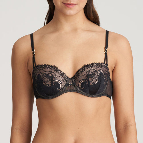 This formed cup balconnet bra gives a lovely horizontal neckline. It is the perfect bra for under tops and dresses. The formed cup offers a uniform shape to the bust. The overlaid black Italian lace presents a classical, feminine look.  Fabric content: Polyamide: 60%, Polyester: 32%, Elastane: 8%