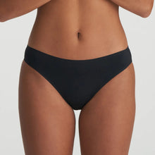 Load image into Gallery viewer, Black bikini bottom worn by a person on a plain background