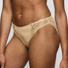 Load image into Gallery viewer, Beige lace underwear worn by a person on a plain background