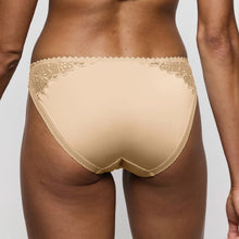 Load image into Gallery viewer, Beige lace-trimmed underwear on a neutral background