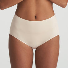 Load image into Gallery viewer, Perfect fit and comfort thanks to these high briefs without visible seams or stitching. The soft microfibre fits snugly over the bum and offers light control on the tummy. A fine glossy border on the waist adds a luxurious touch. No label on the inside and with a soft cotton gusset. These briefs are worn high on the tummy and rest on the hip to elongate the legline. Fabric Content: Polyamide: 79%, Elastane:15%, Polyester: 4%, Cotton: 2%. CAFFÉ LATTE.