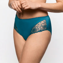 Load image into Gallery viewer, A close-up of a model wearing high-waisted teal blue lace panties against a plain light gray studio background.