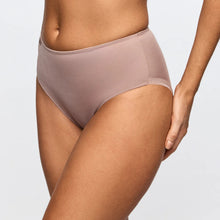 Load image into Gallery viewer, Beige high-waisted underwear worn by a person on a light gray background